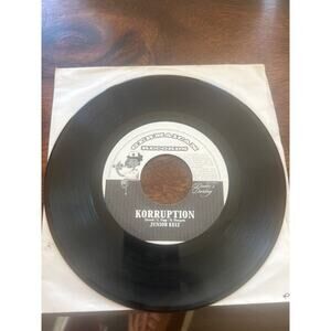 Junior Kelly Corruption - reggae vinyl record 45